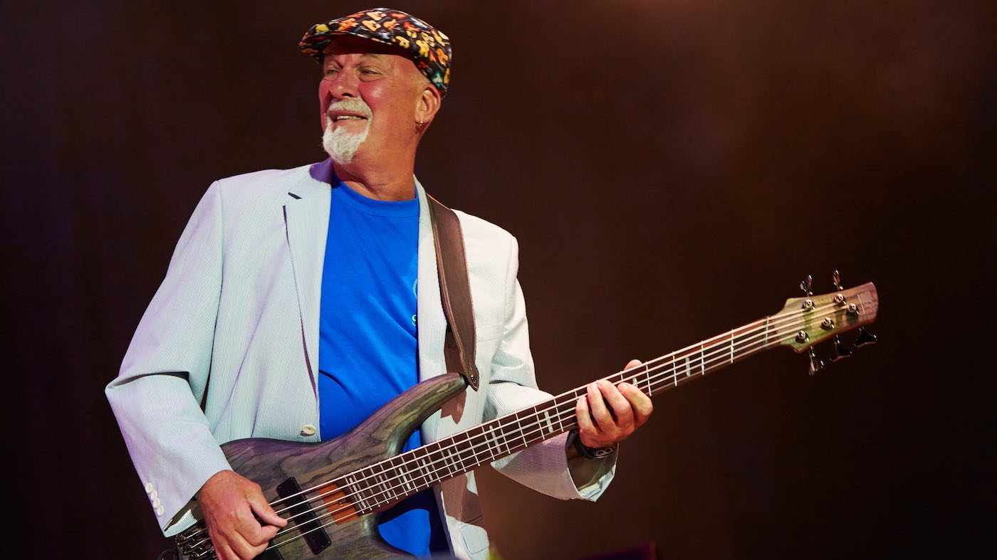Photo of Dave Pegg playing the bass guitar